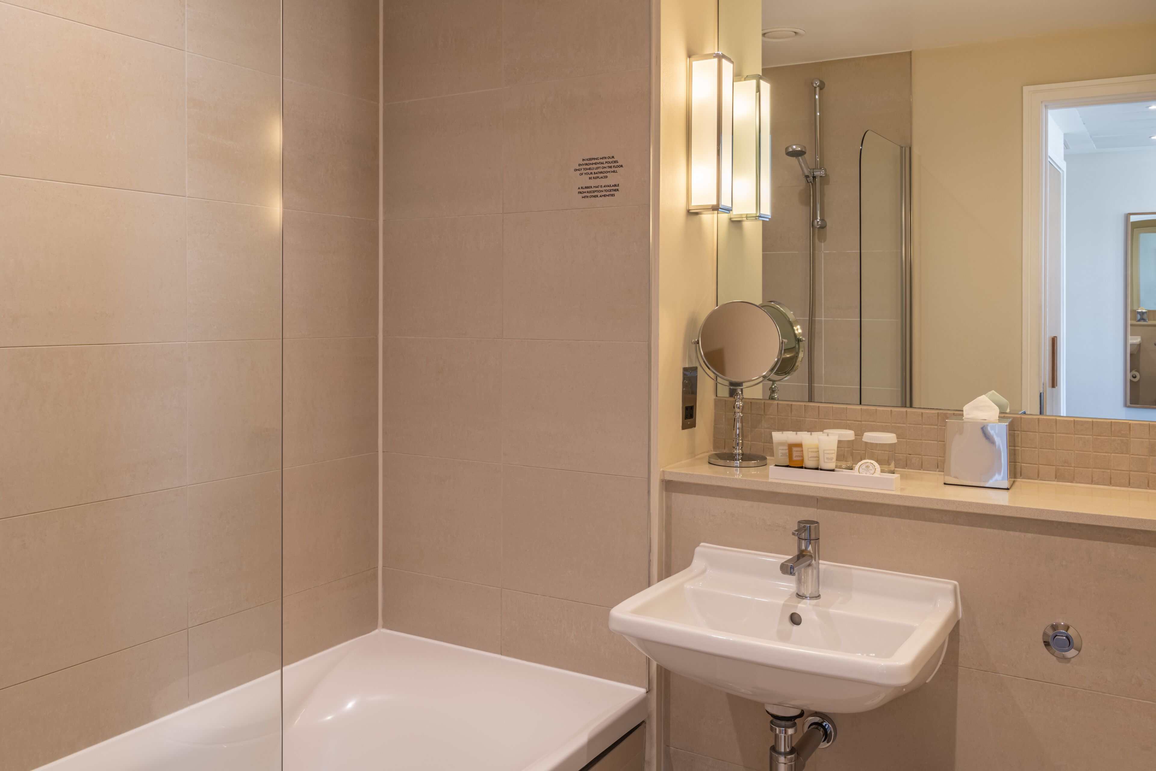 eco-friendly toiletries, hair dryer, towels