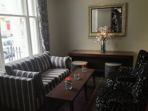 Signature Double Room | Living area | TV