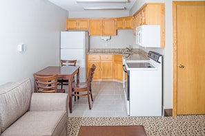 One Bedroom Family Suite (2 Queen Beds) | Private kitchen | Fridge, microwave, coffee/tea maker