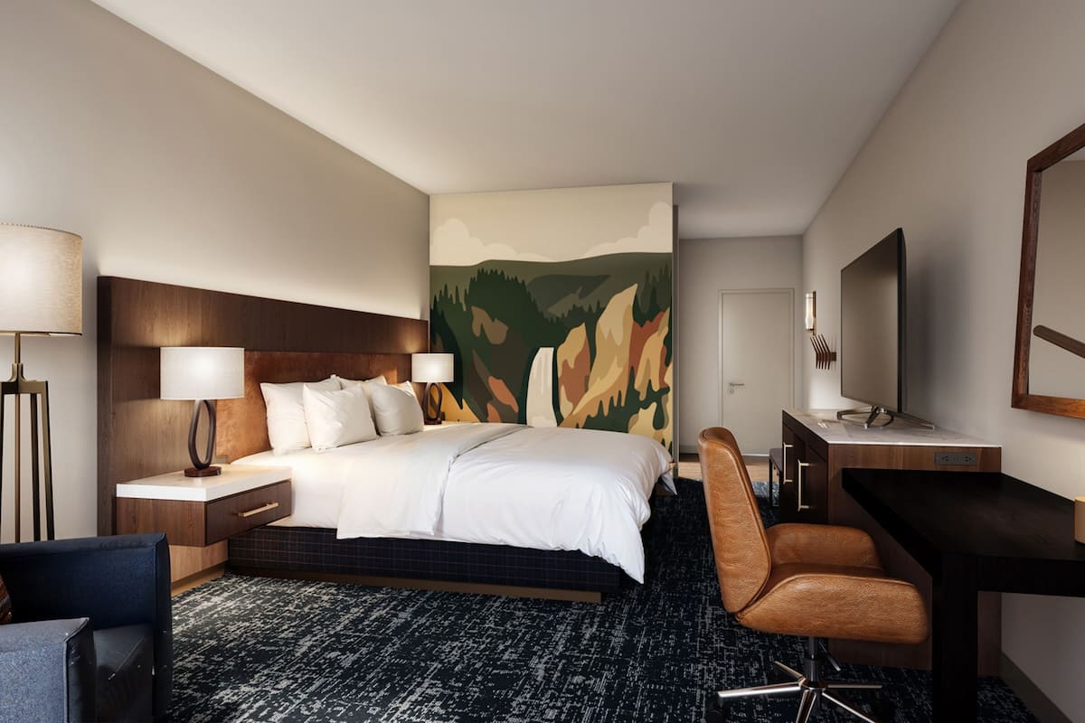 Habitación Deluxe, 1 cama King size | Escritorio, tabla de planchar con plancha, wifi gratis y ropa de cama