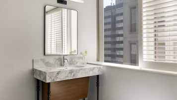 Combined shower/tub, designer toiletries, hair dryer, bathrobes
