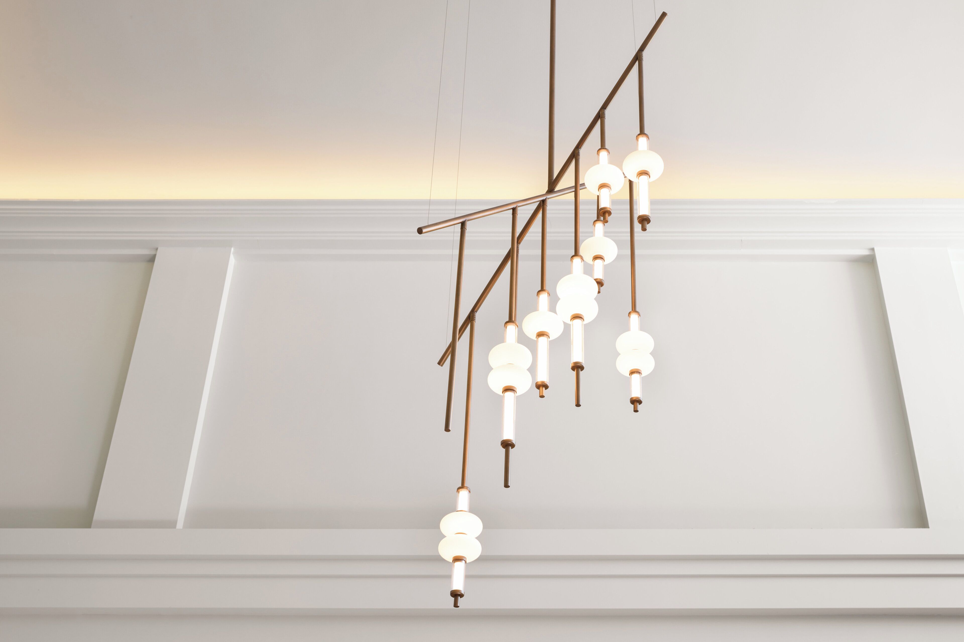 A modern chandelier with multiple hanging light fixtures.