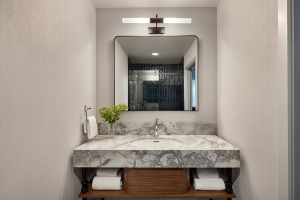 Combined shower/tub, designer toiletries, hair dryer, bathrobes