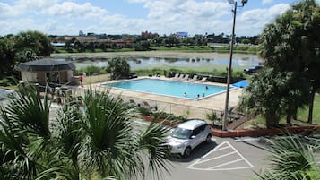 Outdoor pool, open 8:00 AM to 9:00 PM, pool umbrellas, sun loungers
