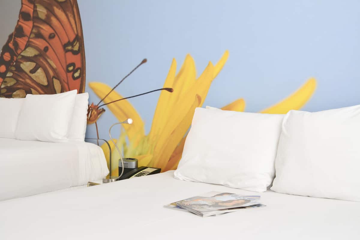 Traditional Room, 2 Queen Beds | In-room safe, individually decorated, desk, iron/ironing board