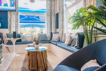 Sitting area in hotel lobby at The Penguin Hotel