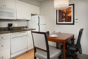Laptop workspace, blackout drapes, iron/ironing board, Internet