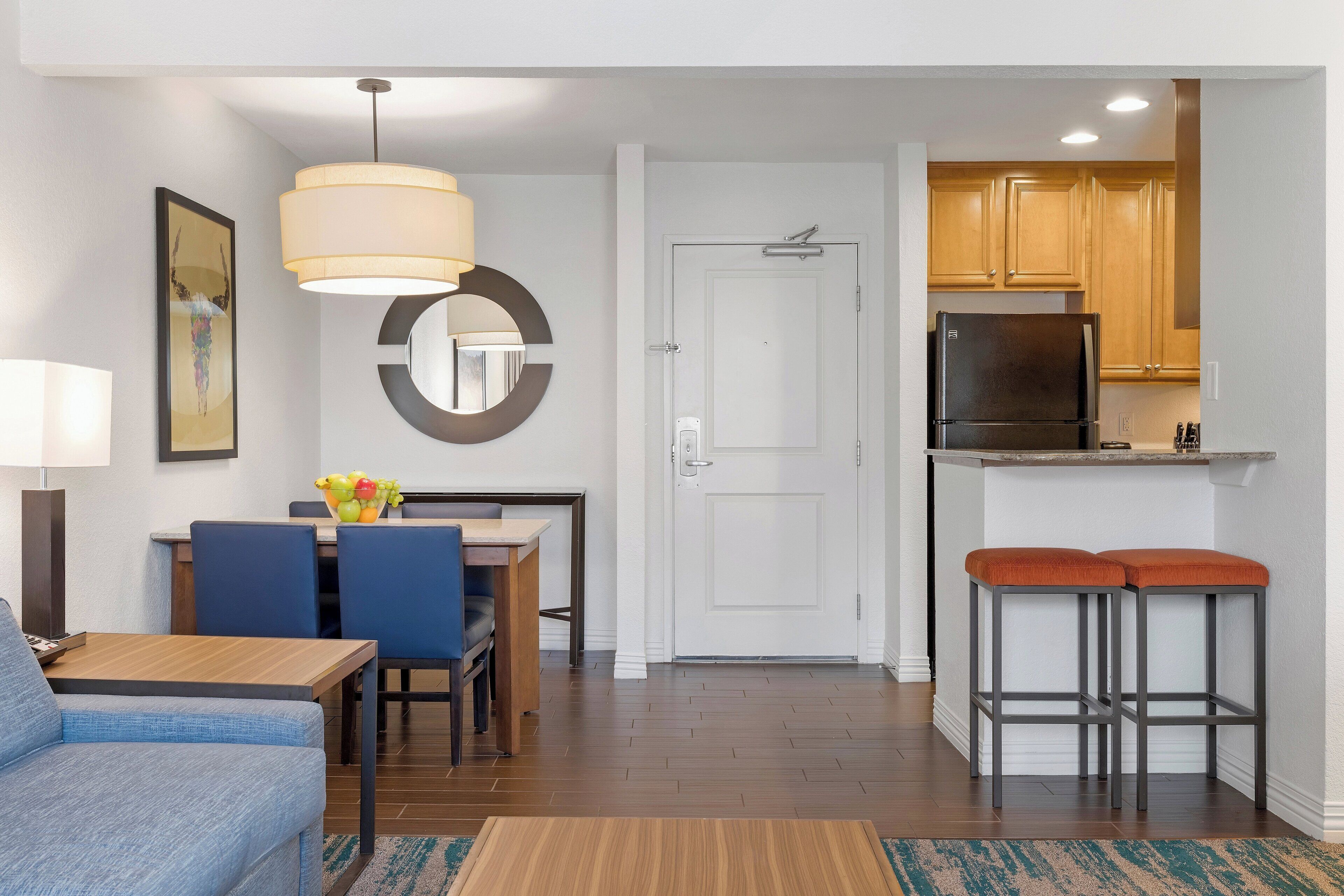 Suite, 2 Bedrooms | Living room | 49-inch LCD TV with cable channels, TV