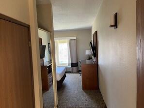 Desk, laptop workspace, blackout curtains, iron/ironing board