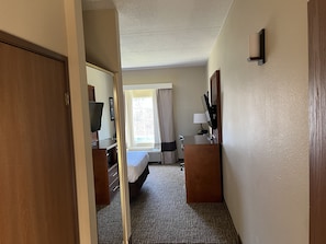 Desk, laptop workspace, blackout curtains, iron/ironing board