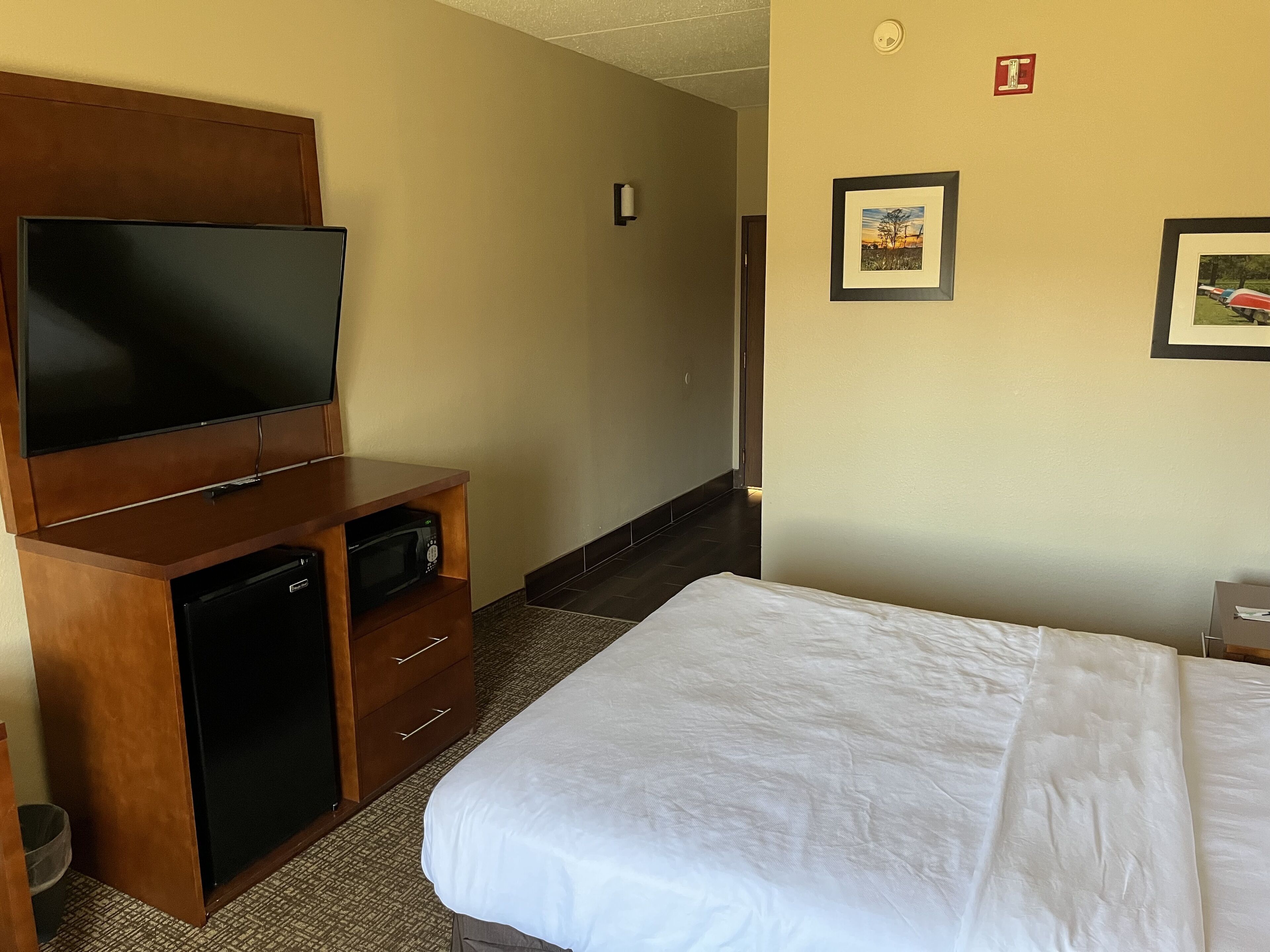 desk, laptop workspace, blackout curtains, iron/ironing board