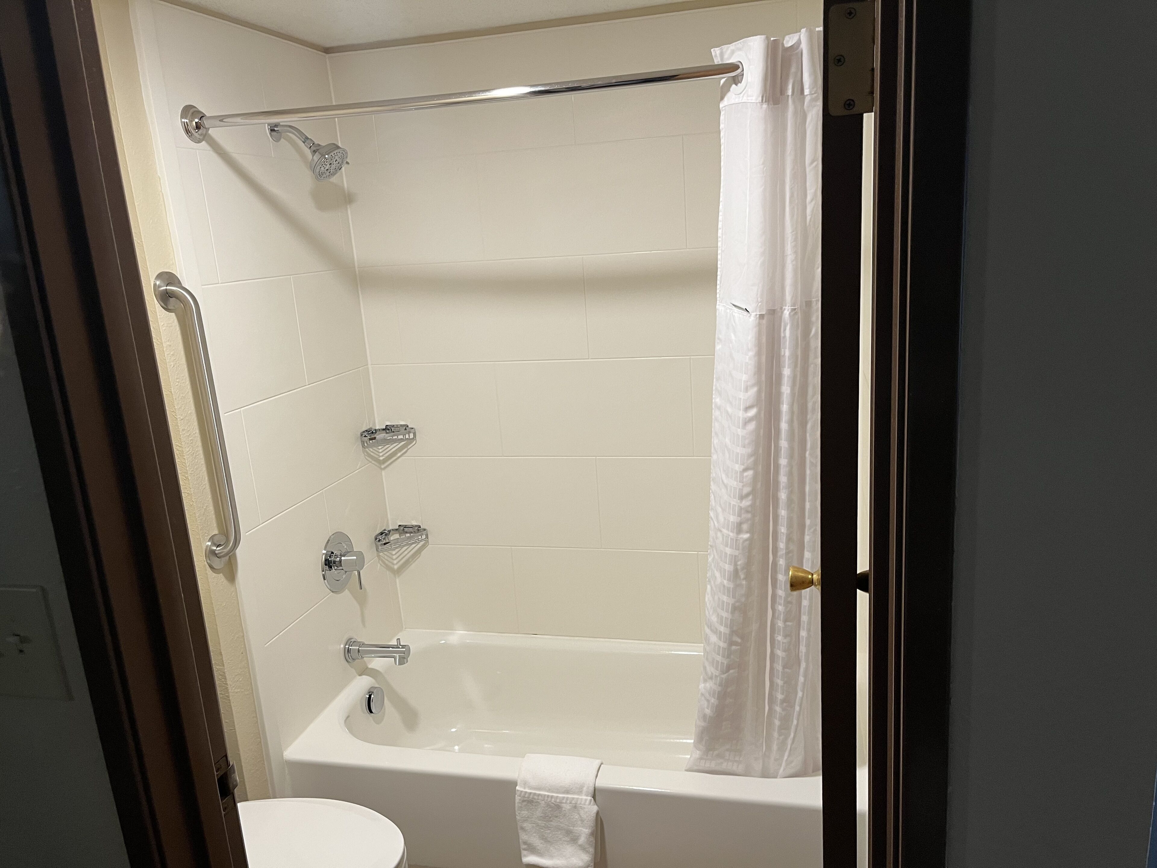 designer toiletries, hair dryer, towels, soap