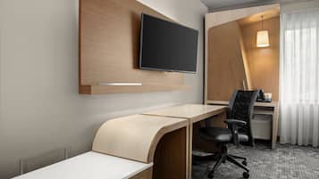 Premium bedding, pillowtop beds, desk, laptop workspace