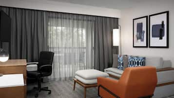 Suite, 1 Bedroom, Corner | Living area | 34-inch Smart TV with digital channels, TV, Netflix