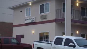 A building with a sign reading "Town House Inn".