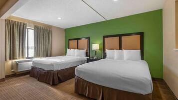 Desk, laptop workspace, free WiFi, bed sheets