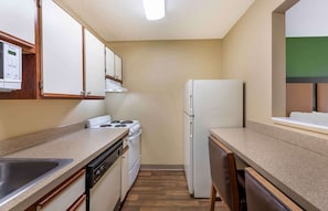 Deluxe Studio, Multiple Beds, Non Smoking | Private kitchen | Full-size fridge, microwave, stovetop