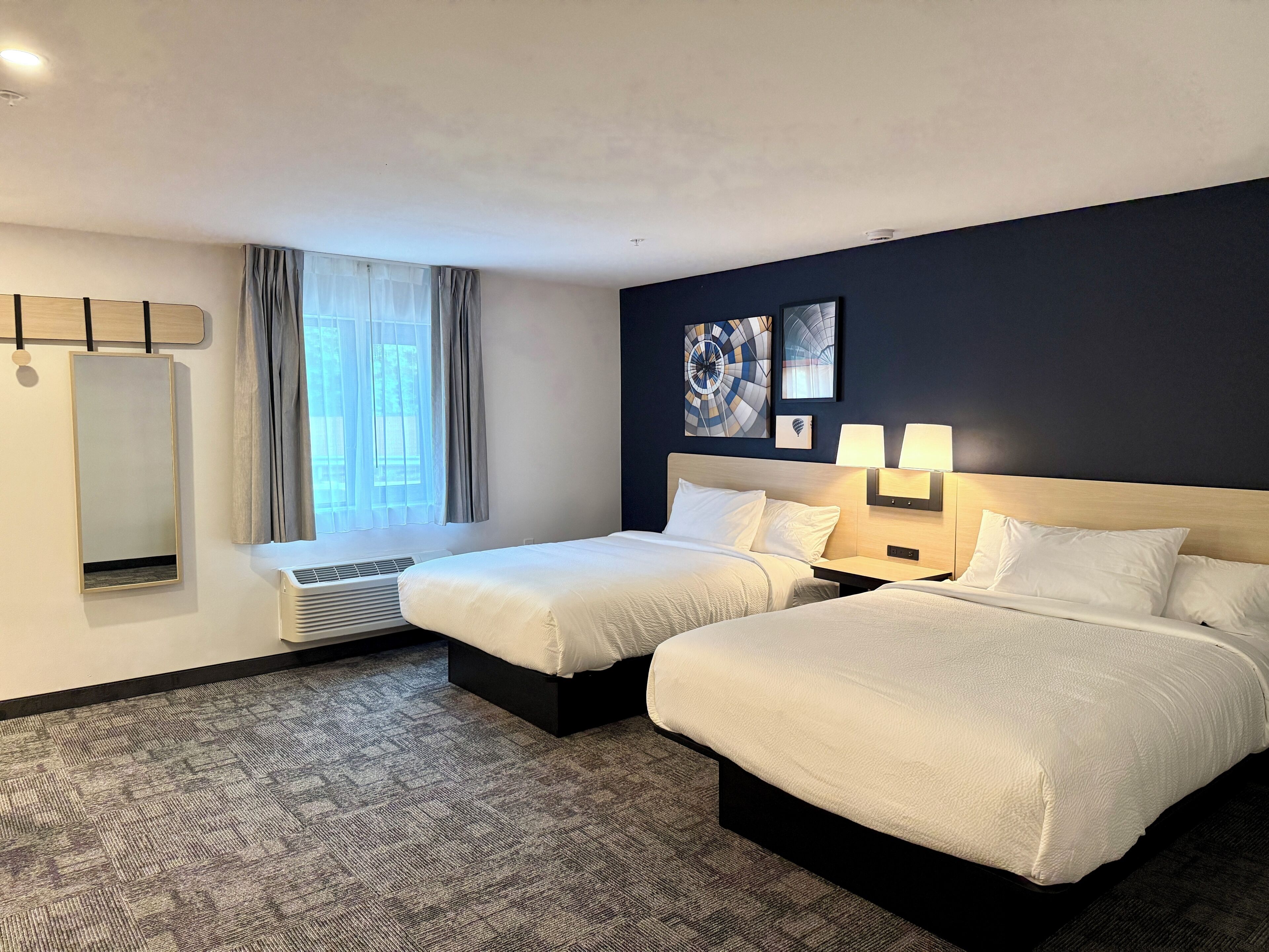 Premium bedding, down comforters, pillowtop beds, desk