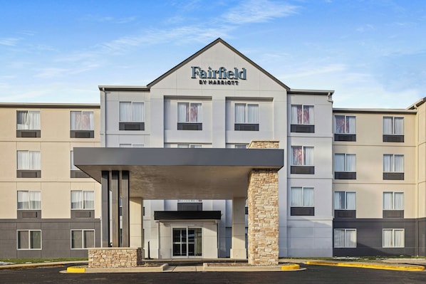 A Fairfield by Marriott hotel with a modern facade, multiple windows, and a central entrance.