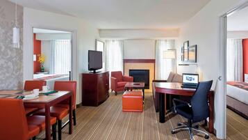 Desk, laptop workspace, iron/ironing board, free cots/infant beds