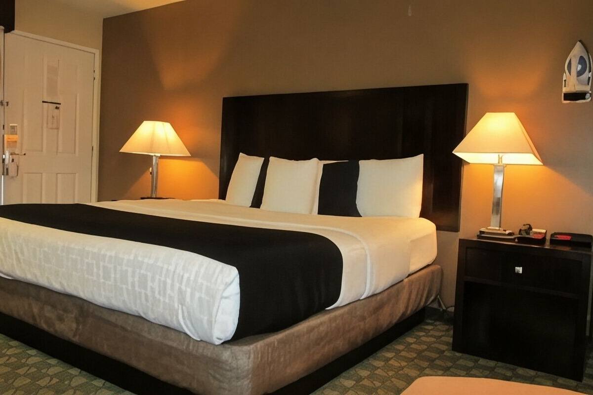 Pillowtop beds, desk, blackout drapes, iron/ironing board
