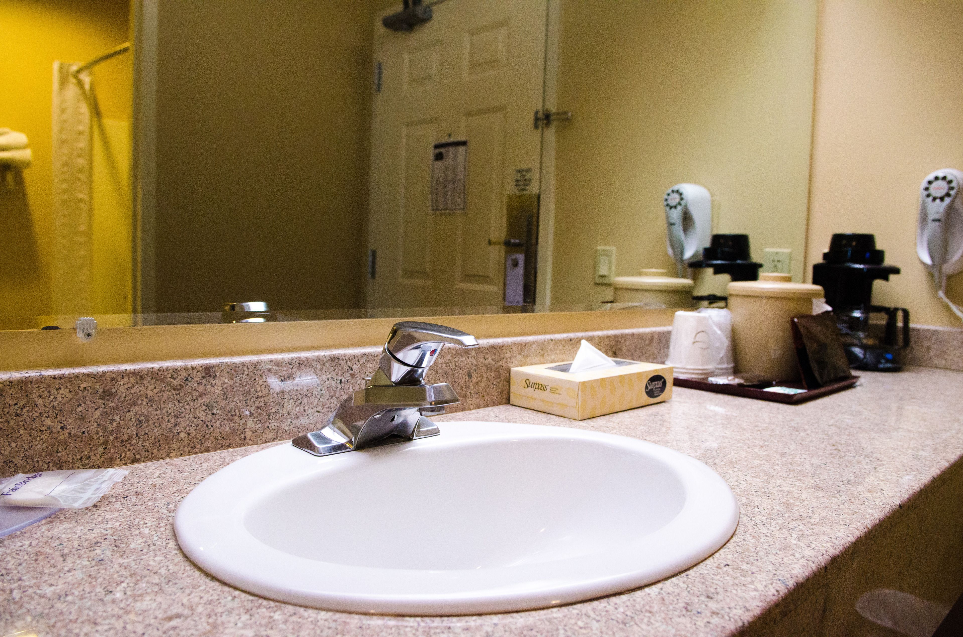 deluxe room, 2 queen beds | bathroom sink