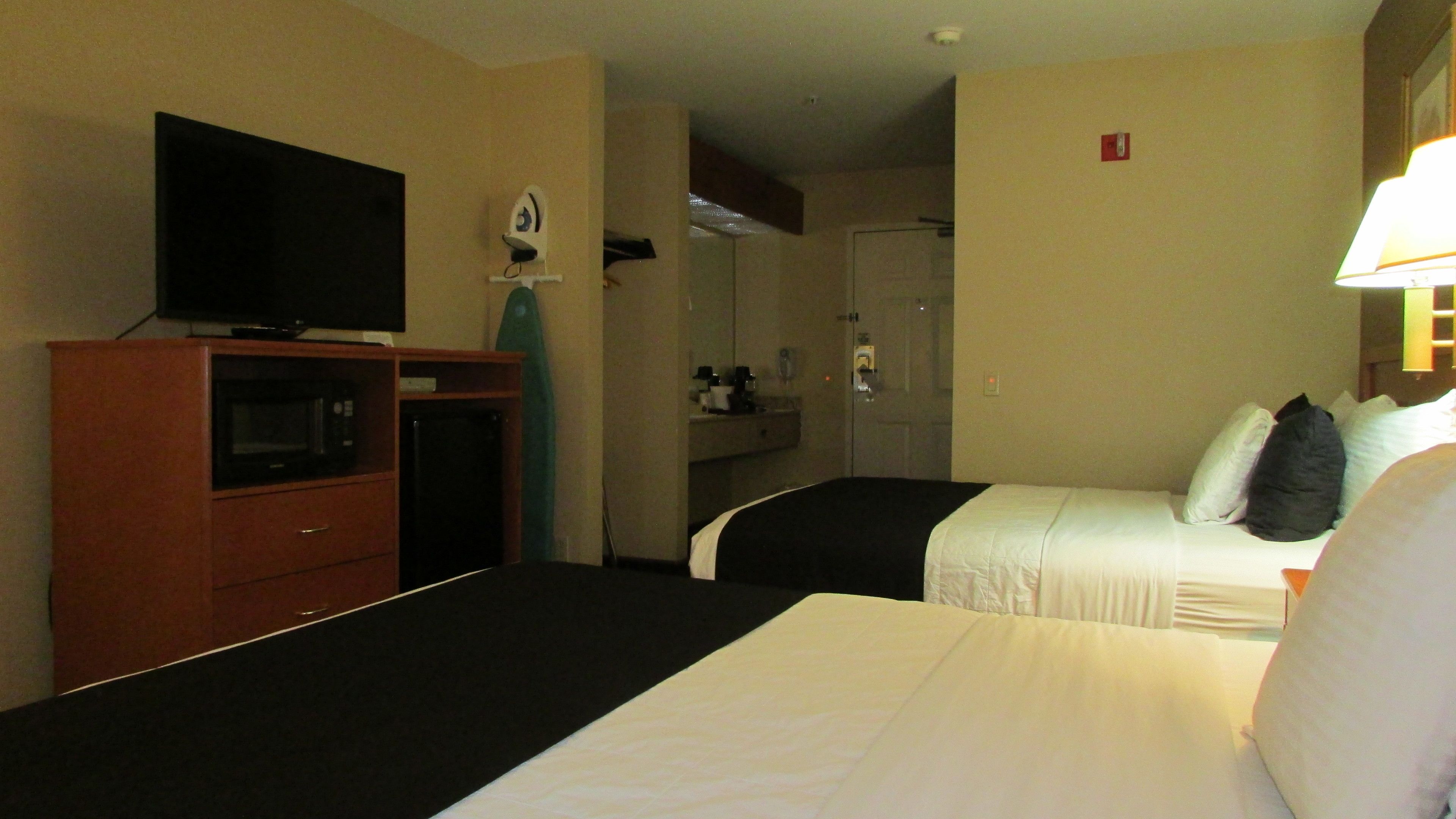 deluxe room, 2 queen beds | pillow-top beds, desk, blackout curtains, iron/ironing board