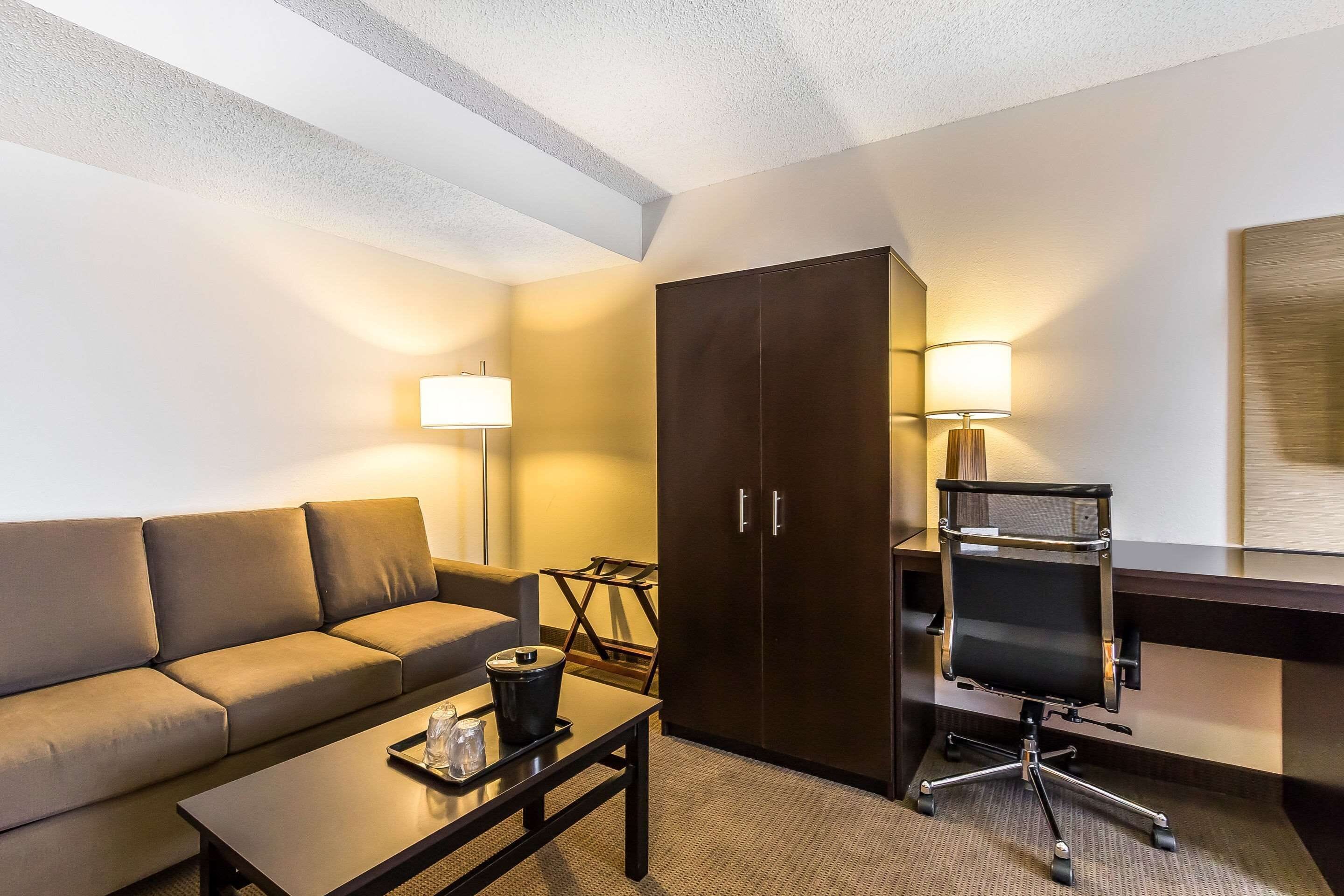 suite, 1 king bed, non smoking | desk, blackout curtains, iron/ironing board, free wifi