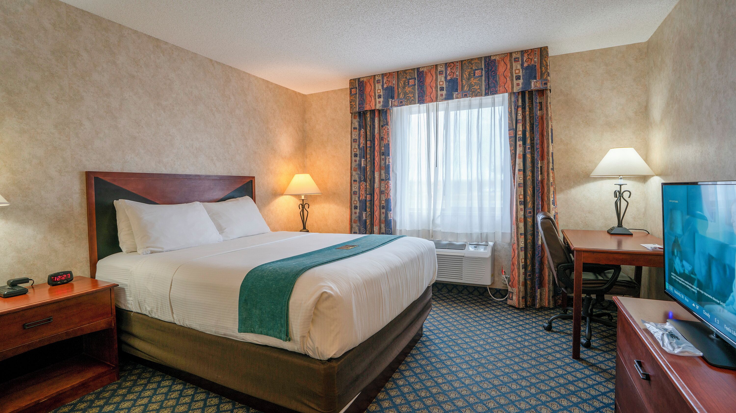 Deluxe Suite, 1 Queen Bed with Sofa bed | Blackout drapes, iron/ironing board, free WiFi, bed sheets