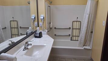 Combined shower/tub, deep soaking tub, free toiletries, hair dryer