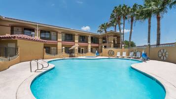 Outdoor pool, open 11:00 AM to 10:00 PM, pool umbrellas, sun loungers
