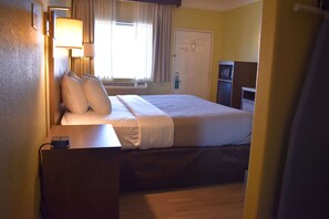 Premium bedding, down comforters, iron/ironing board, free WiFi