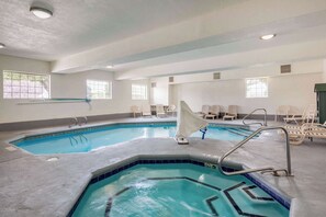 Indoor pool, open 7:00 AM to 10:00 PM, pool loungers
