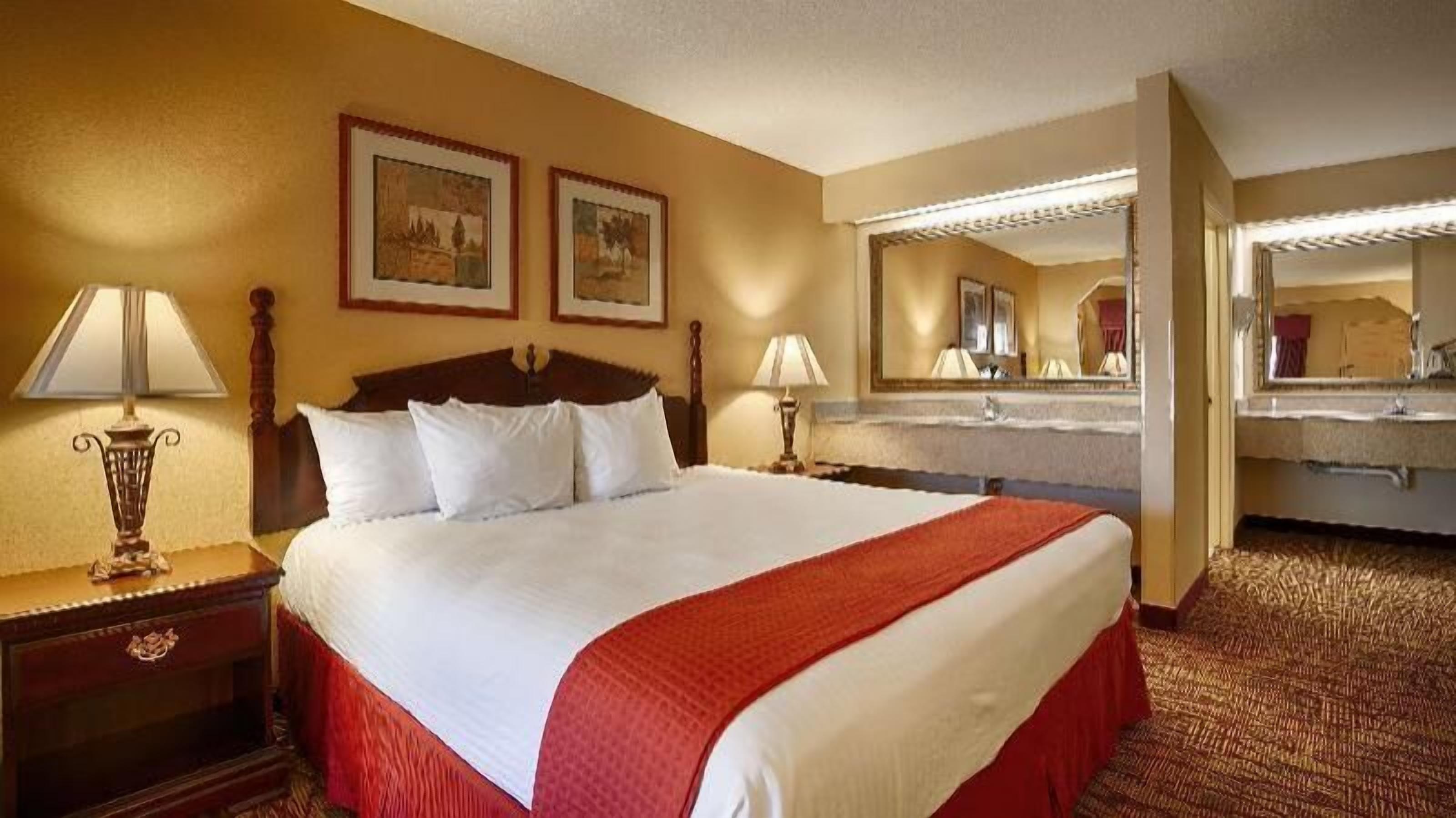 Desk, laptop workspace, iron/ironing board, cribs/infant beds