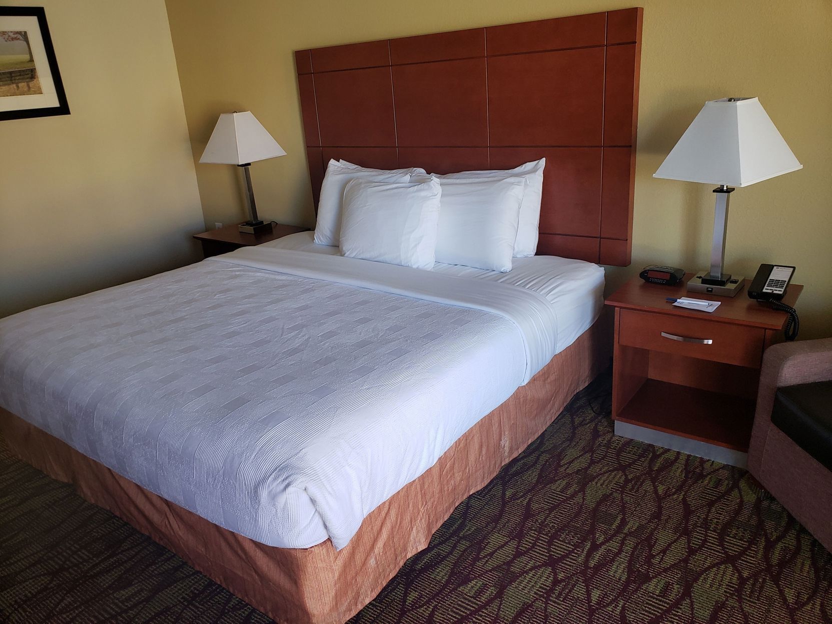 Desk, laptop workspace, iron/ironing board, cribs/infant beds