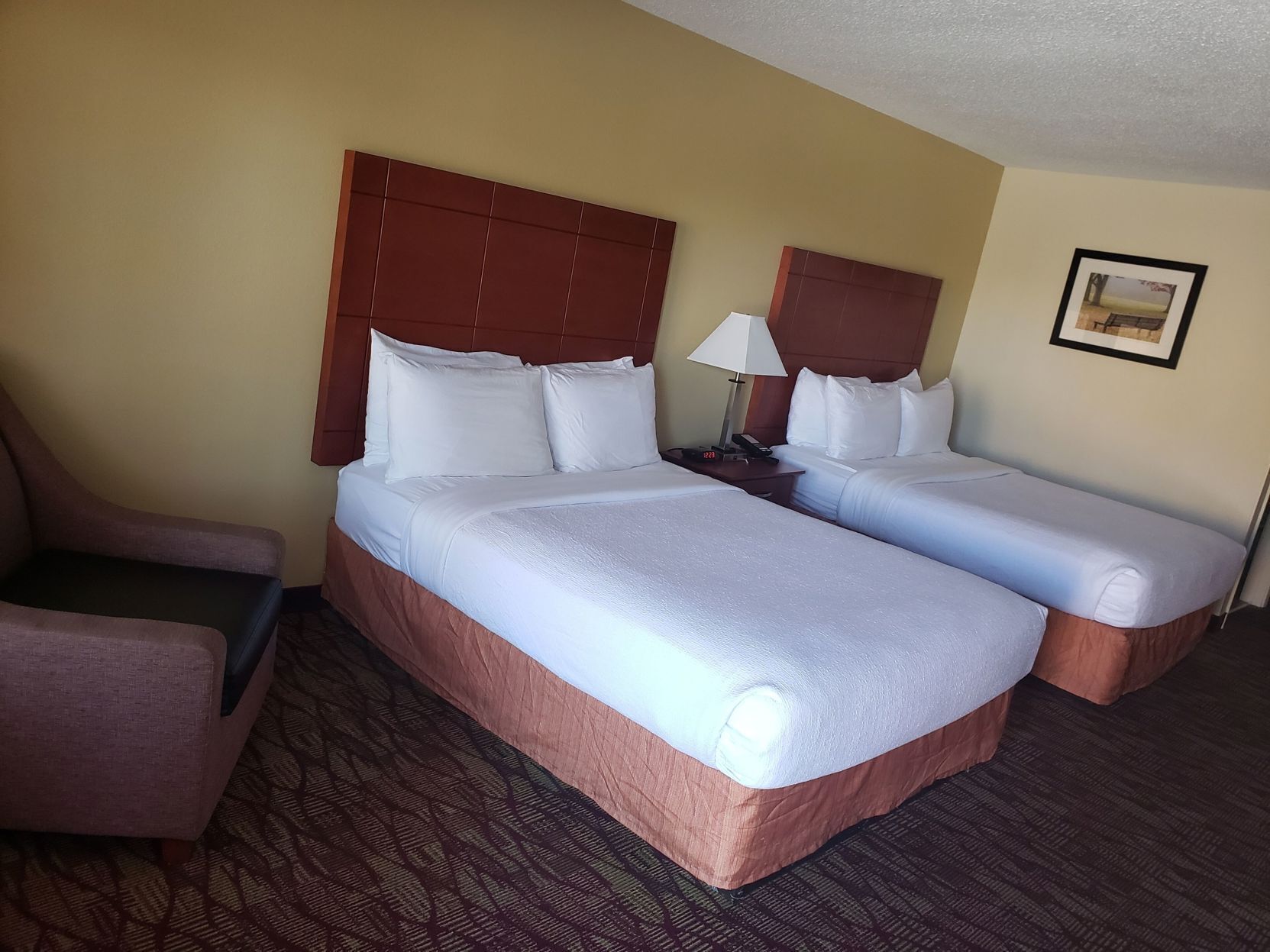 Desk, laptop workspace, iron/ironing board, cribs/infant beds