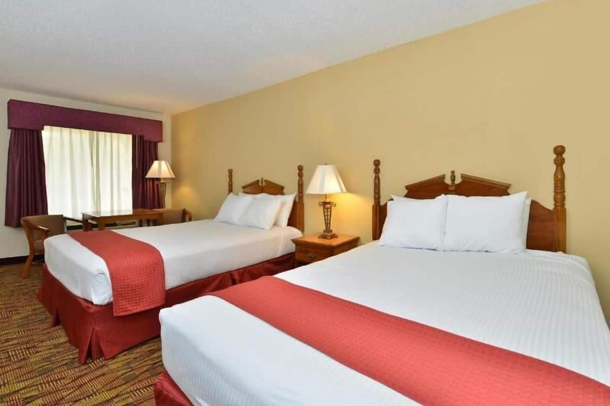 Desk, laptop workspace, iron/ironing board, cribs/infant beds