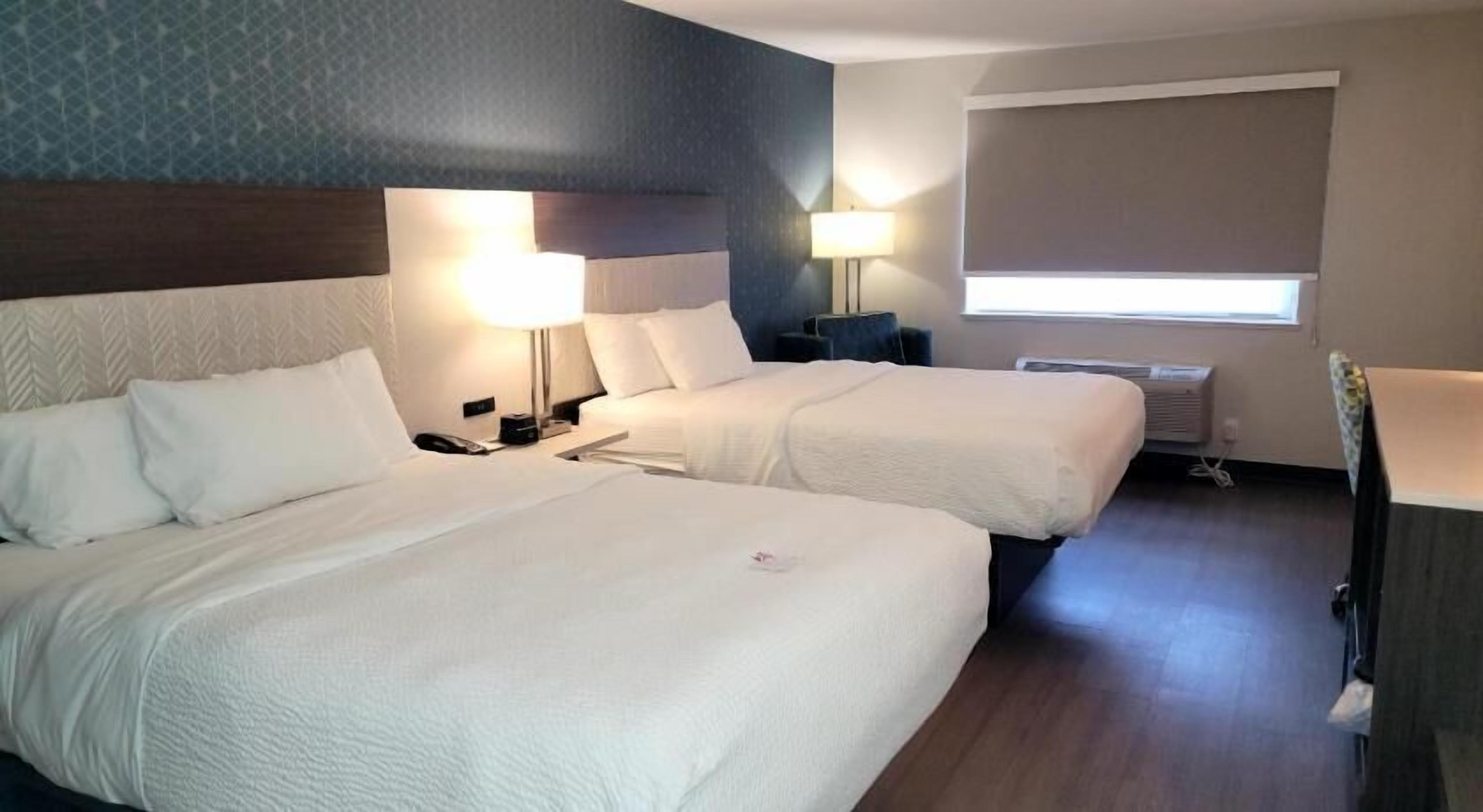 Premium bedding, desk, iron/ironing board, free cribs/infant beds