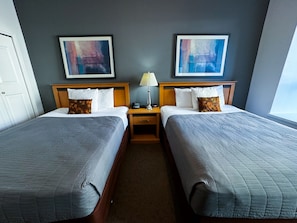 Premium bedding, desk, blackout drapes, iron/ironing board