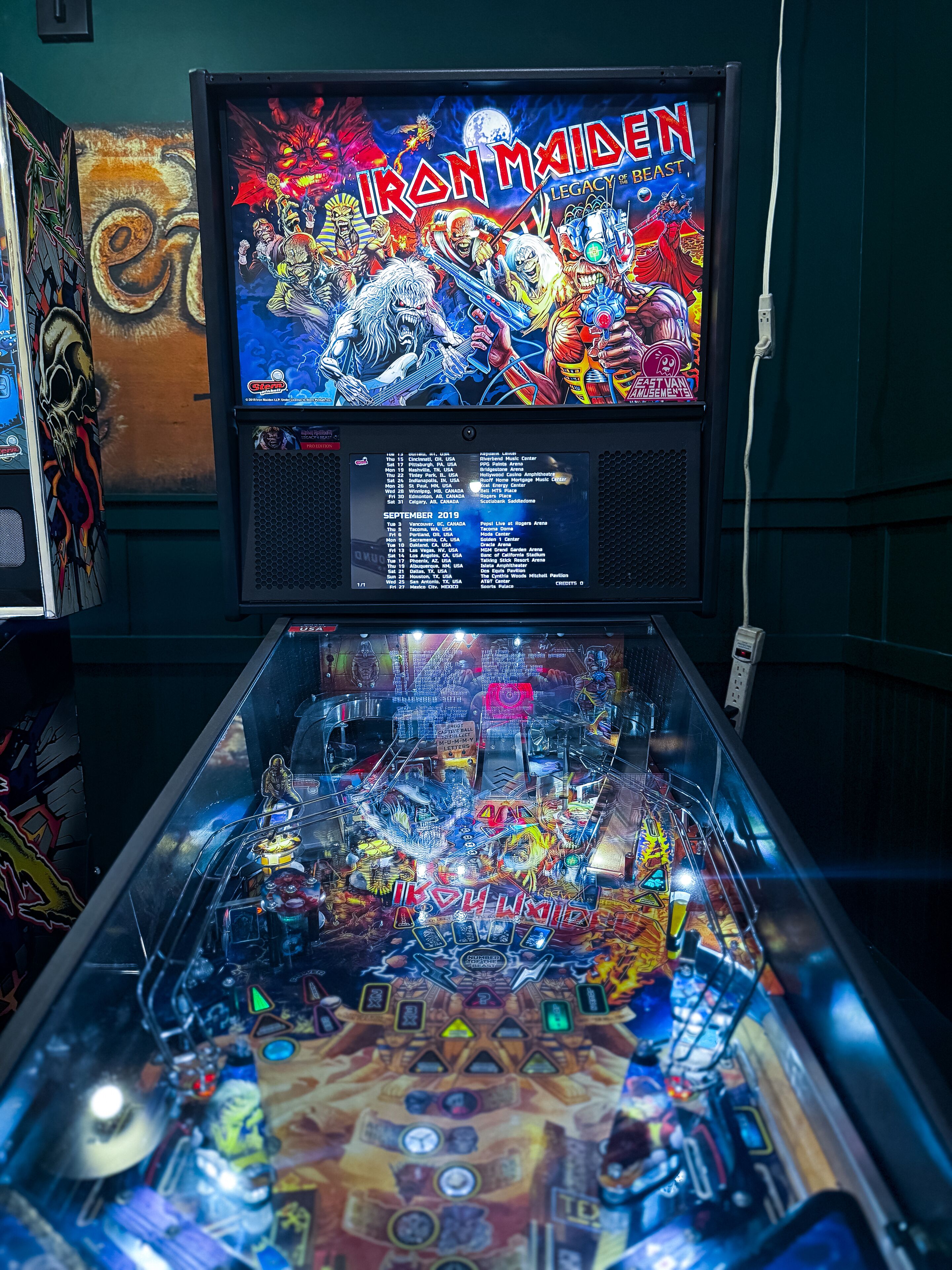A pinball machine with a vibrant display and detailed artwork.