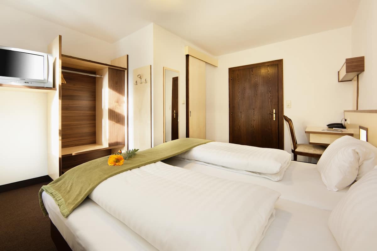 double or twin room | pillow-top beds, desk, soundproofing, cots/infant beds