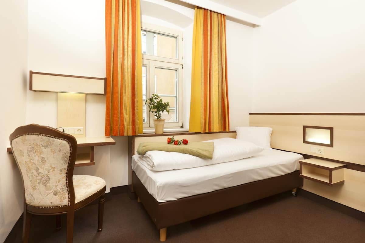 single room | pillow-top beds, desk, soundproofing, cots/infant beds