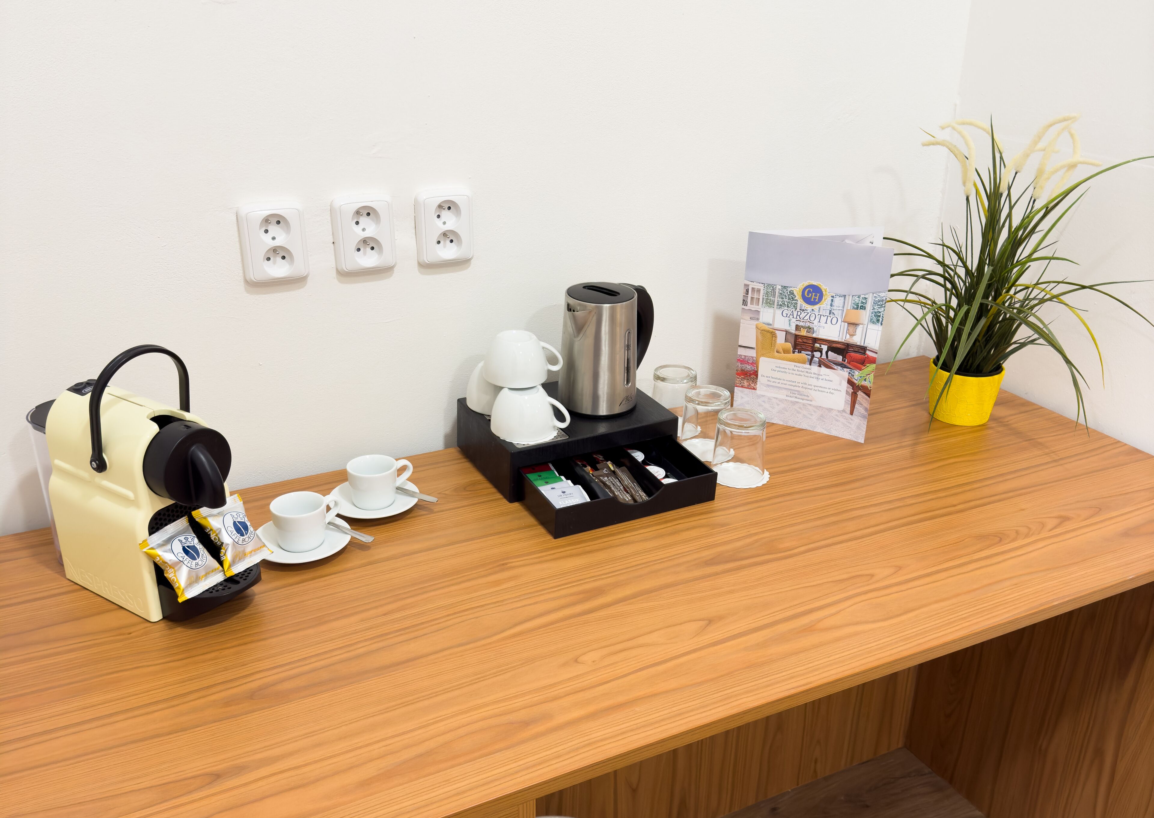 comfort room | in-room safe, desk, blackout curtains, iron/ironing board