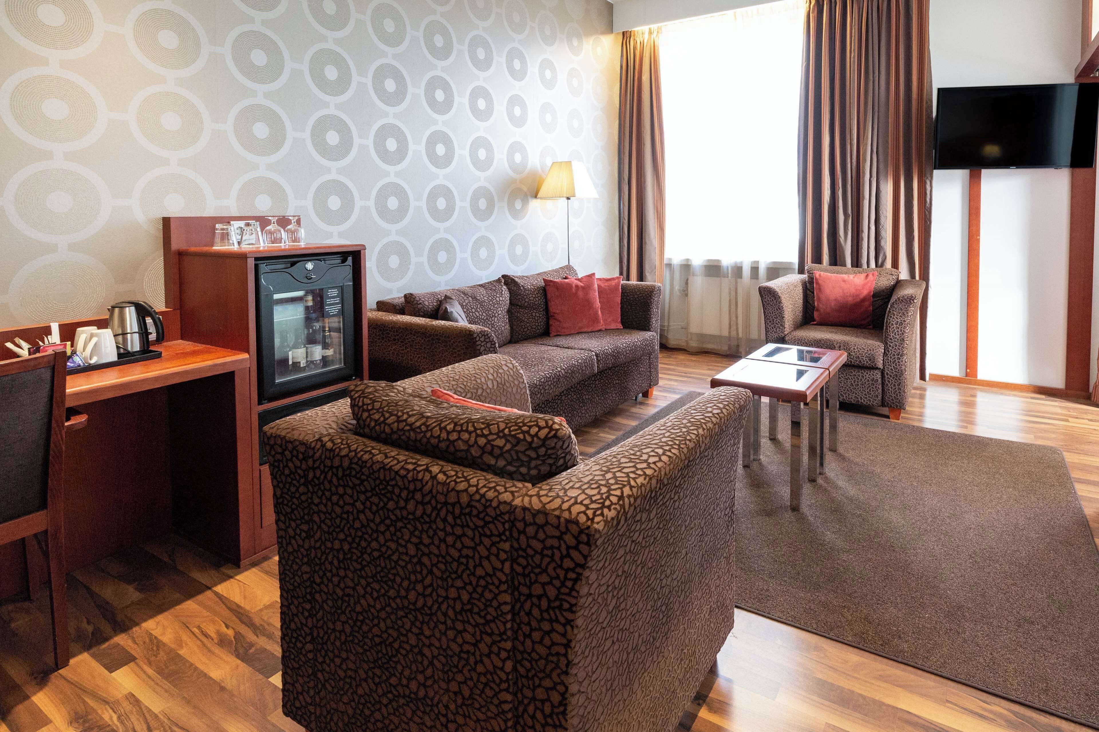 Junior Suite, 1 King Bed with Sofa bed | Minibar, in-room safe, desk, blackout curtains