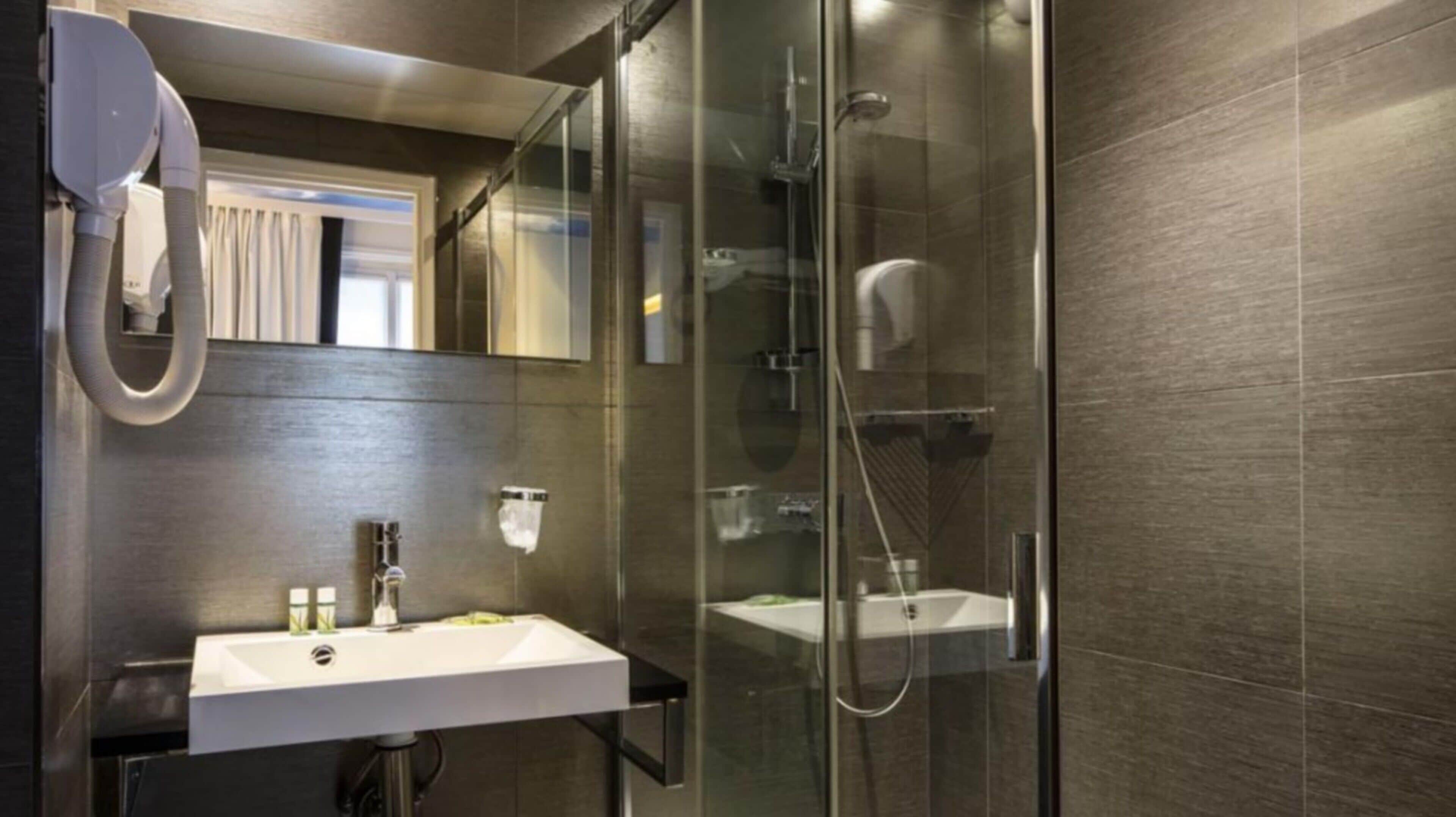 hair dryer, towels, soap, shampoo