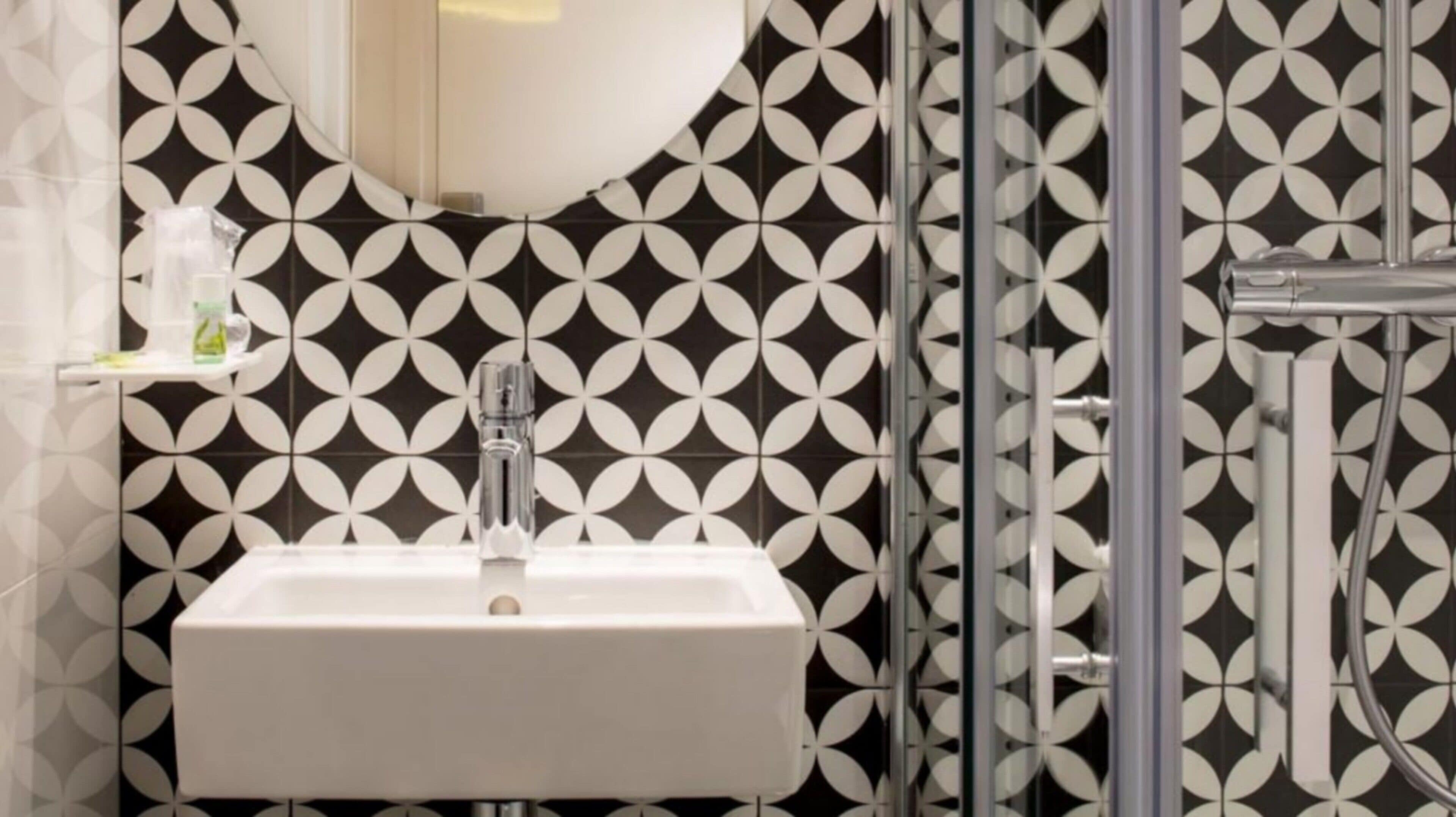 club twin room | bathroom | hair dryer, towels, soap, shampoo