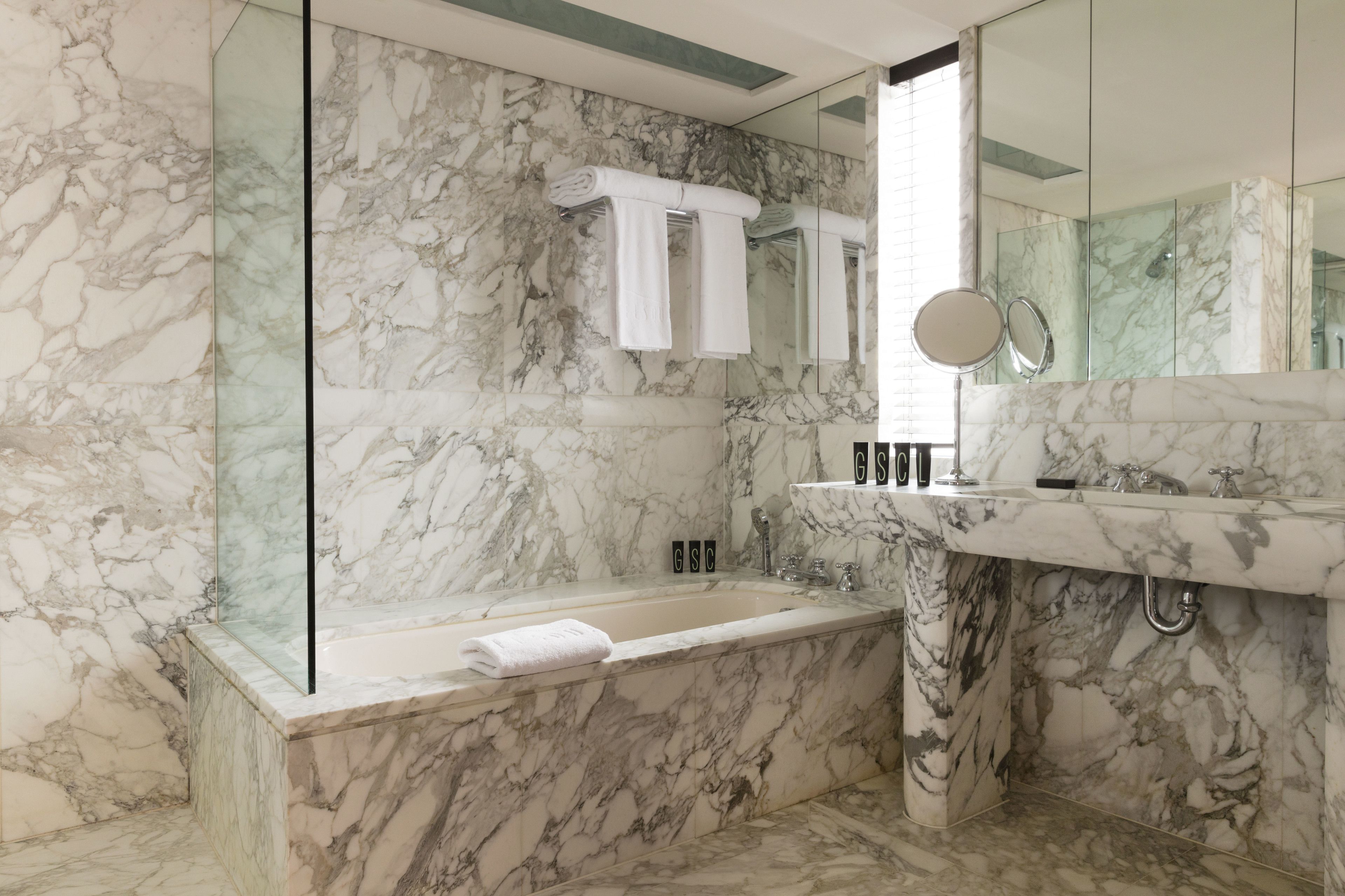 suite | bathroom | combined shower/bathtub, designer toiletries, hair dryer, bathrobes