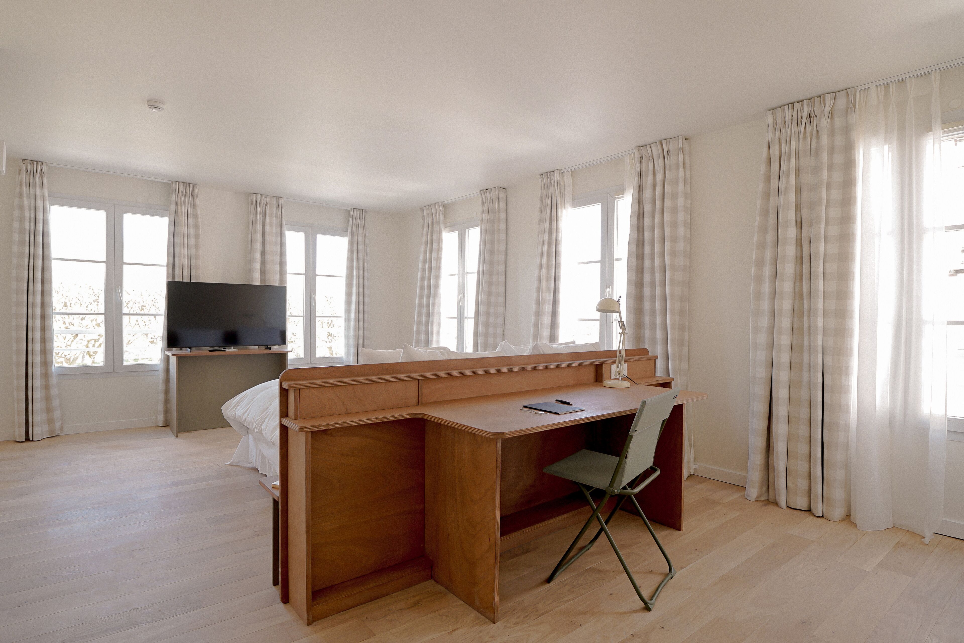 Luxe beddengoed, pillowtop-bedden, een minibar, een bureau