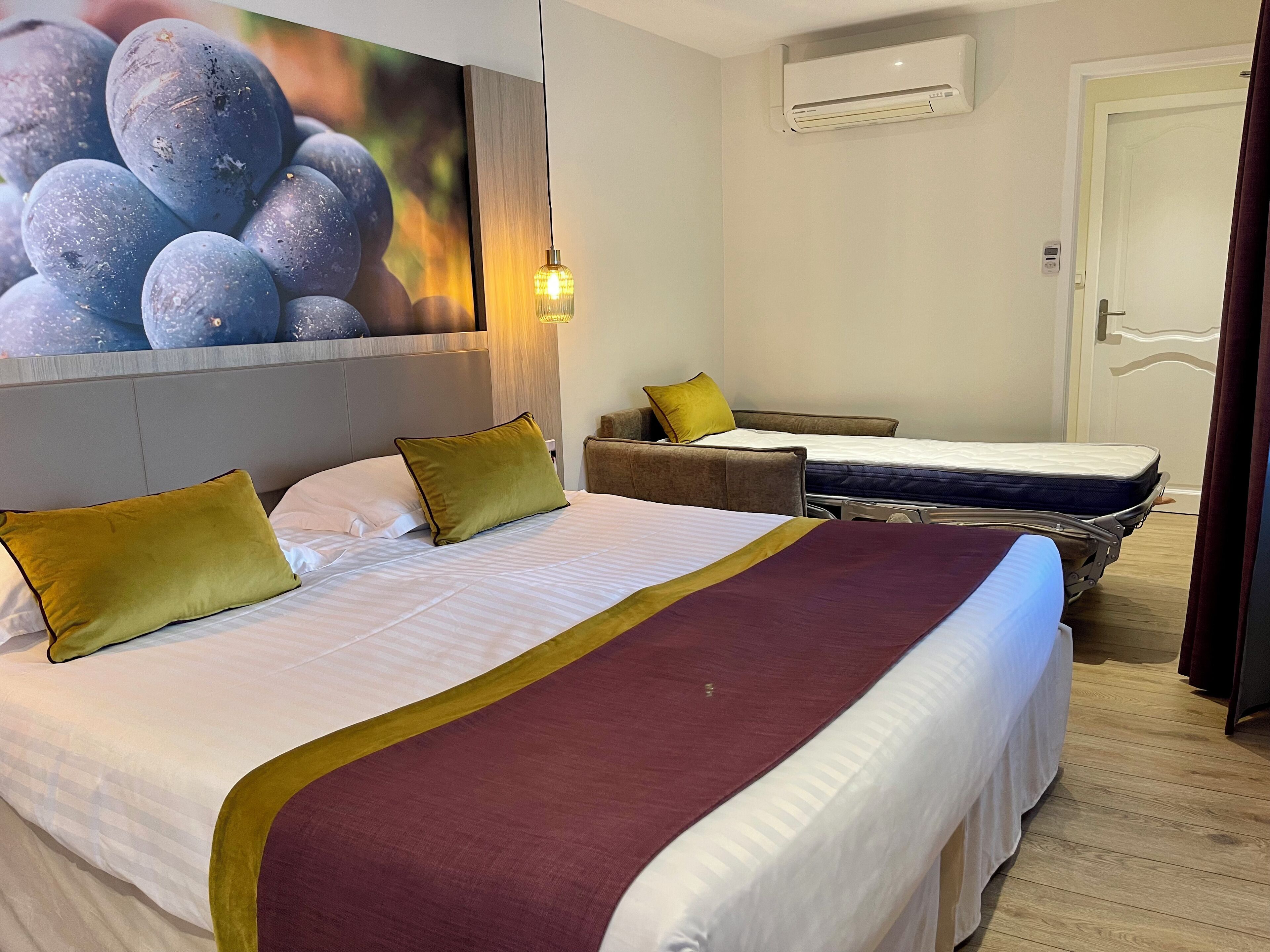 deluxe room, multiple beds, non smoking | 1 bedroom, premium bedding, in-room safe, individually decorated