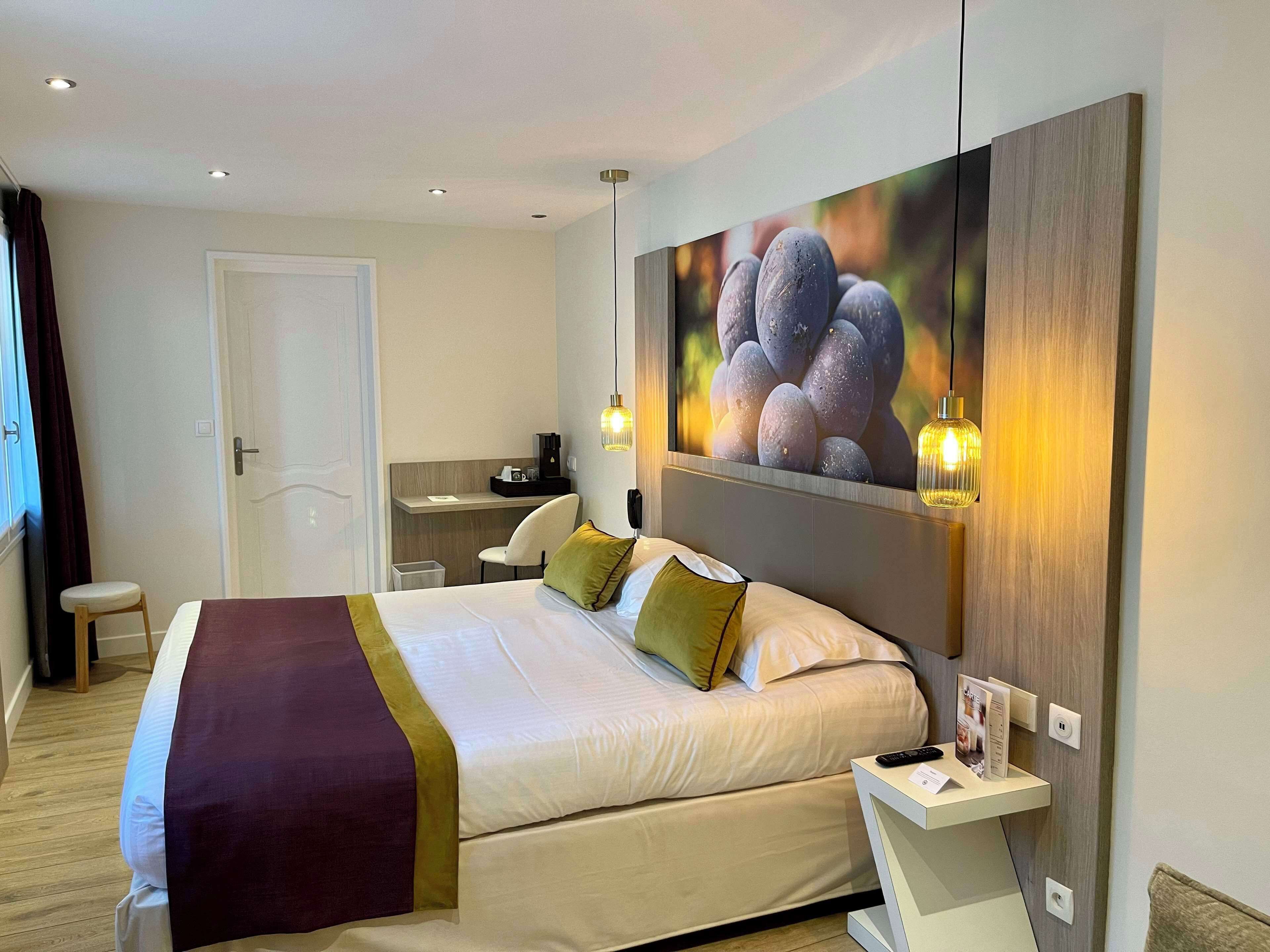 deluxe room, multiple beds, non smoking | 1 bedroom, premium bedding, in-room safe, individually decorated